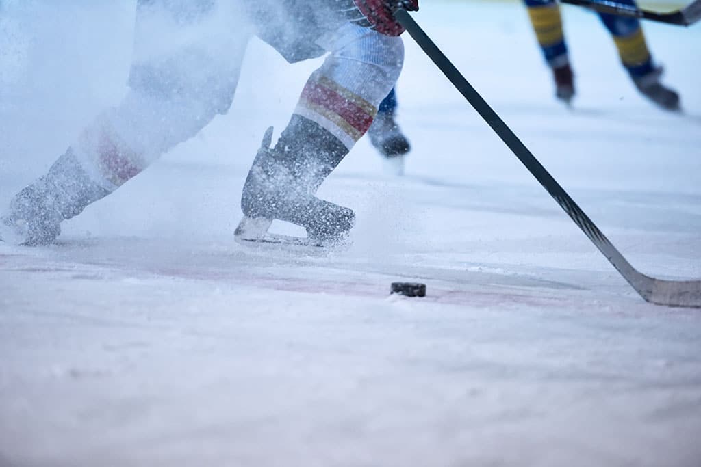 hockey player skating with the puck