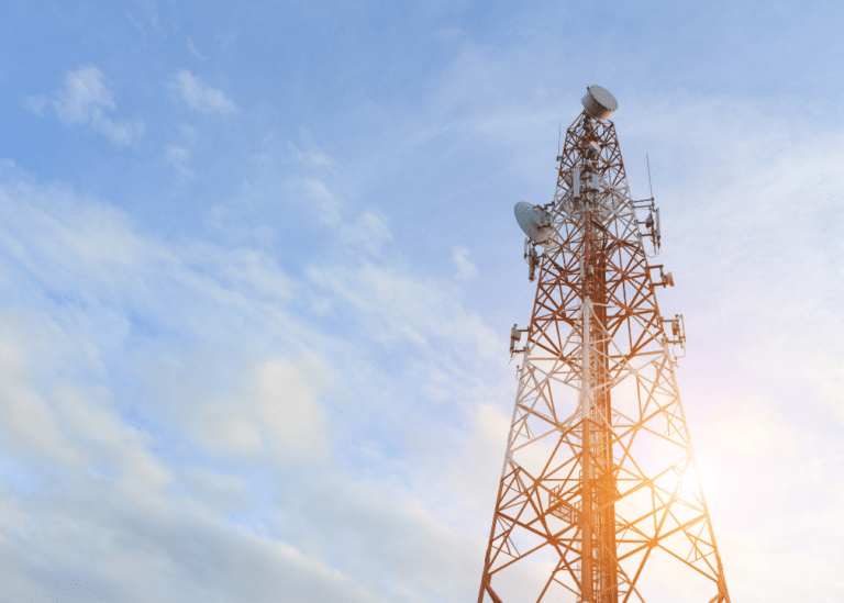 Broadcast tower with blue sky in background