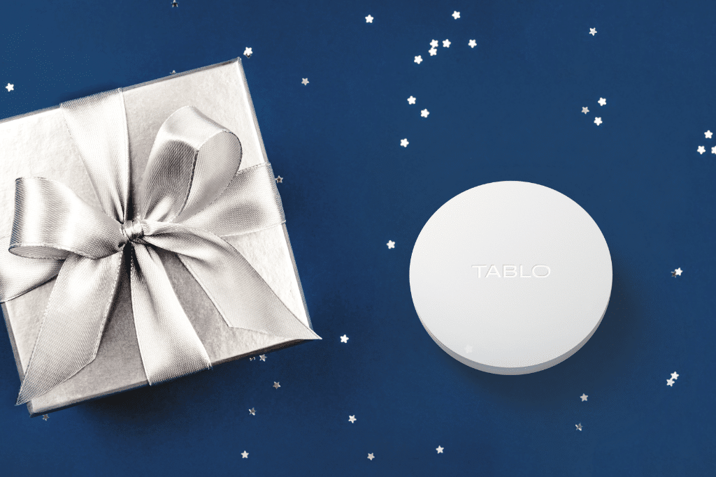 Tablo device and gift wrapped in silver paper