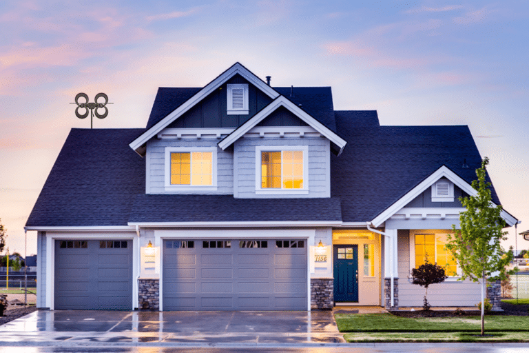 Beautiful house with a TV antenna mounted on the roof of the garage