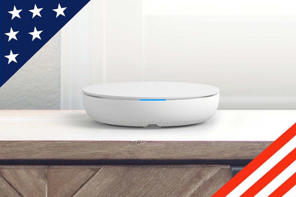 4th Generation Tablo on table, framed by American Flag stars and stripes.