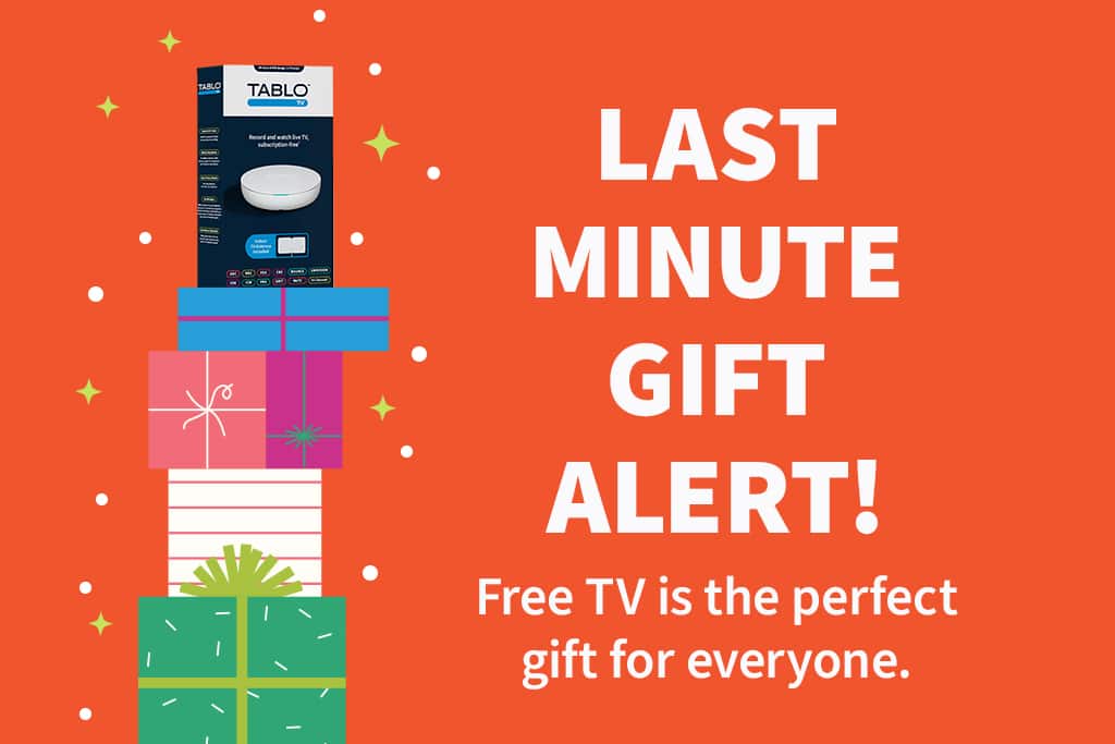Last minute gift alert! Free TV is the perfect give for everyone. A Tablo box on a tower of presents, with snow drifting down.